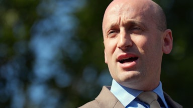 Stephen Miller speaks to reporters outside the White House
