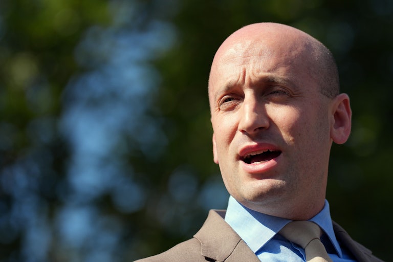 Stephen Miller speaks to reporters outside the White House