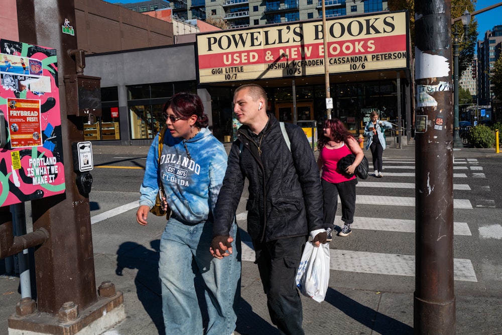 People walk through the downtown section of Portland, Oregon.