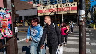 People walk through the downtown section of Portland, Oregon.