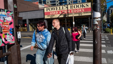 People walk through the downtown section of Portland, Oregon.