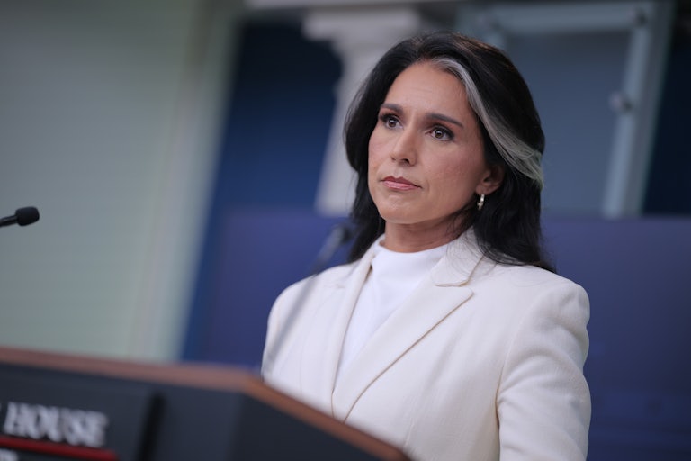 Director of National Intelligence Tulsi Gabbard sits at a press conference.