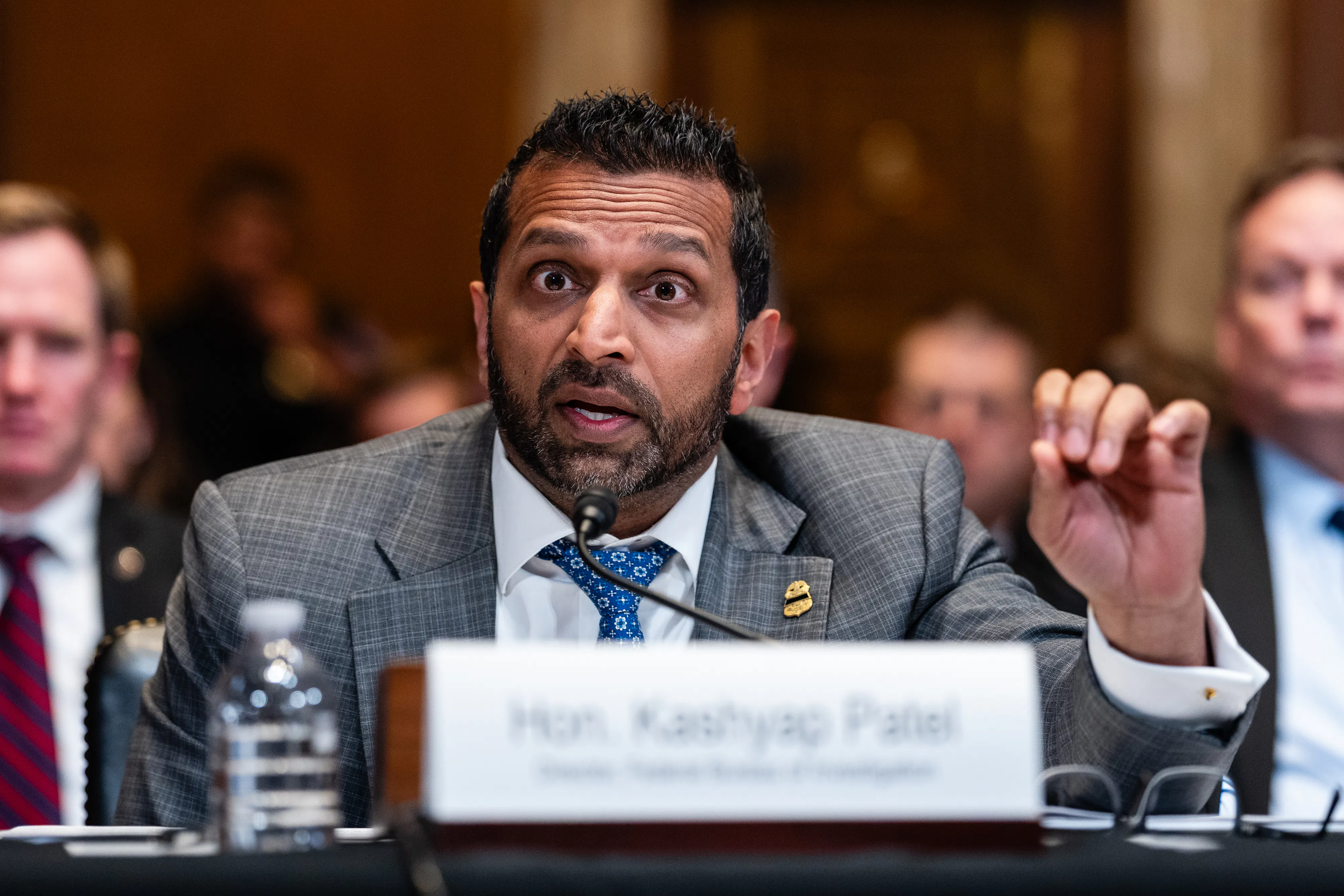 FBI Director Kash Patel gestures while speaking during a congressional hearing