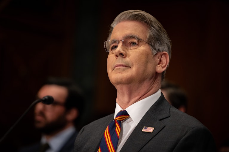 Treasury Secretary Scott Bessent sits in a Senate hearing