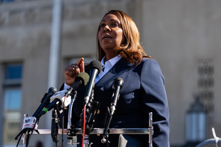 New York Attorney General Letitia James gestures while speaking outside a courthouse