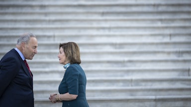 Chuck Schumer and Nancy Pelosi have a chat on the steps of the U.S. Capitol.