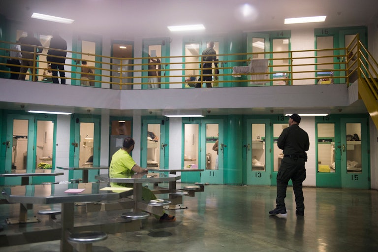 tables and holding cells in a prison