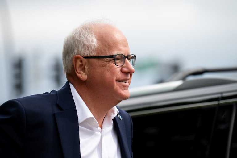 Minnesota Governor Tim Walz smiles