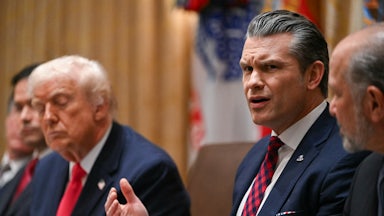 Pete Hegseth speaks in a meeting with Donald Trump.