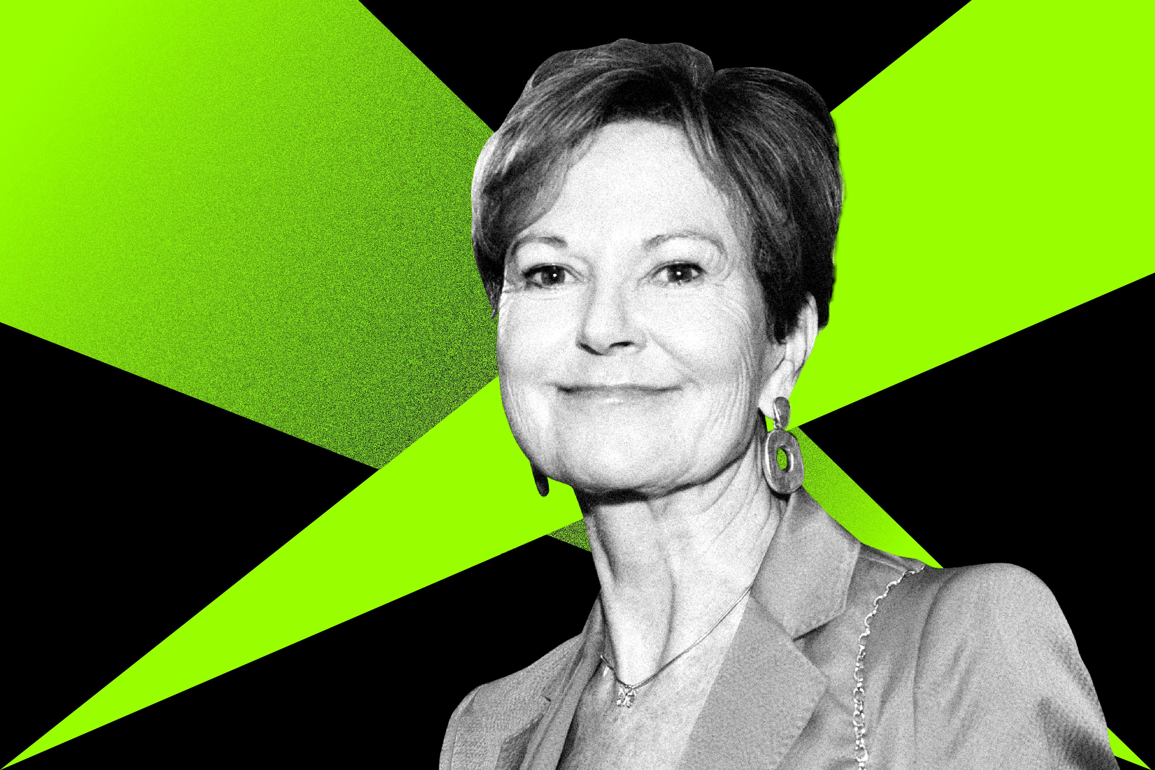 Journalist Kati Marton in front of a green and black background