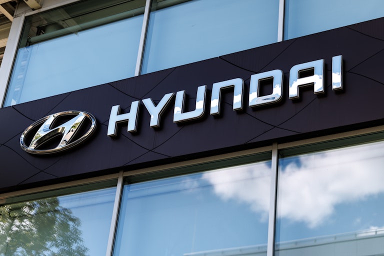 The logo of the car company Hyundai.