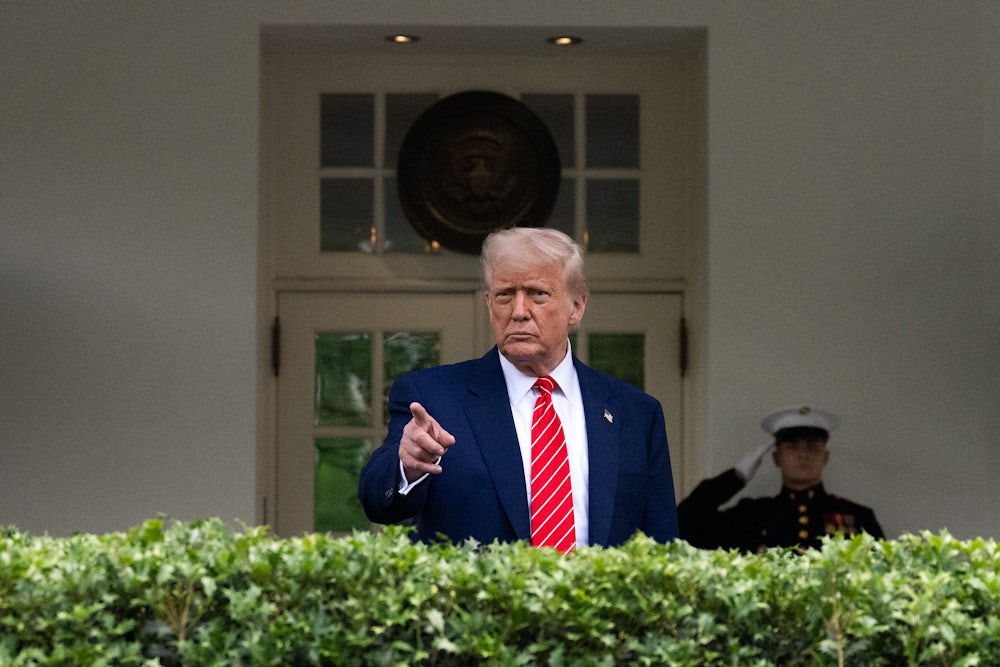 President Donald Trump takes questions outside the West Wing of White House