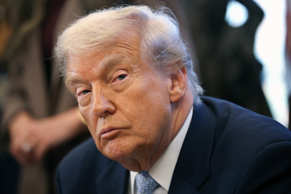 Donald Trump looks tired as he stares into camera