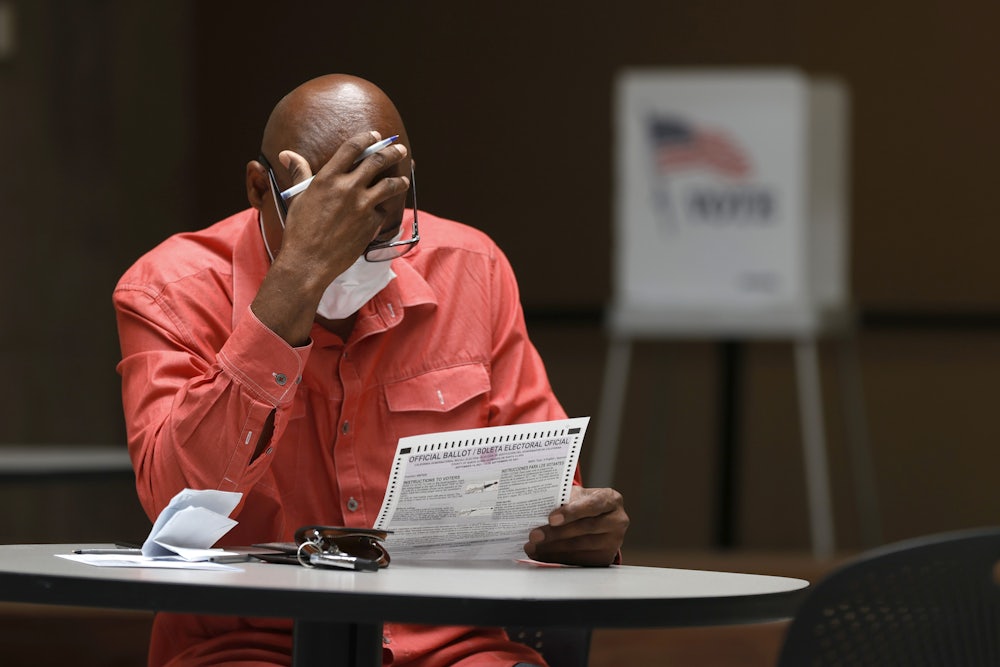 A California voter prepares to cast his ballot in the recall election of Gavin Newsom.