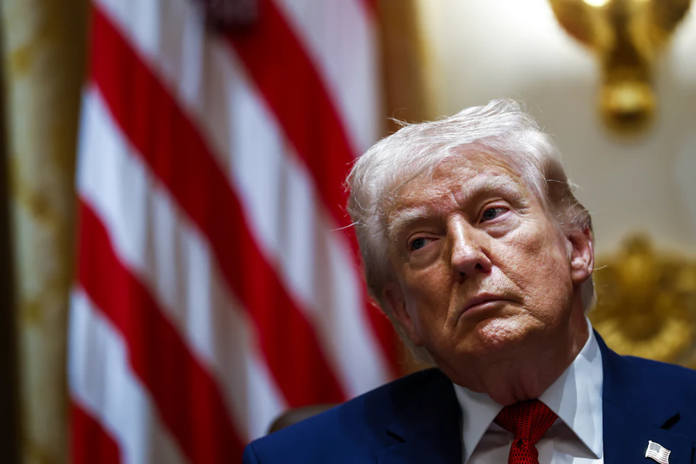 Donald Trump stares tiredly