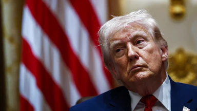 Donald Trump stares tiredly