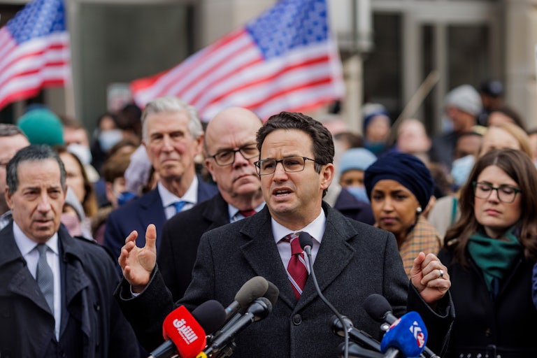 Senator Brian Schatz speaks to reporters outside the USAID headquarters in Washington, D.C.