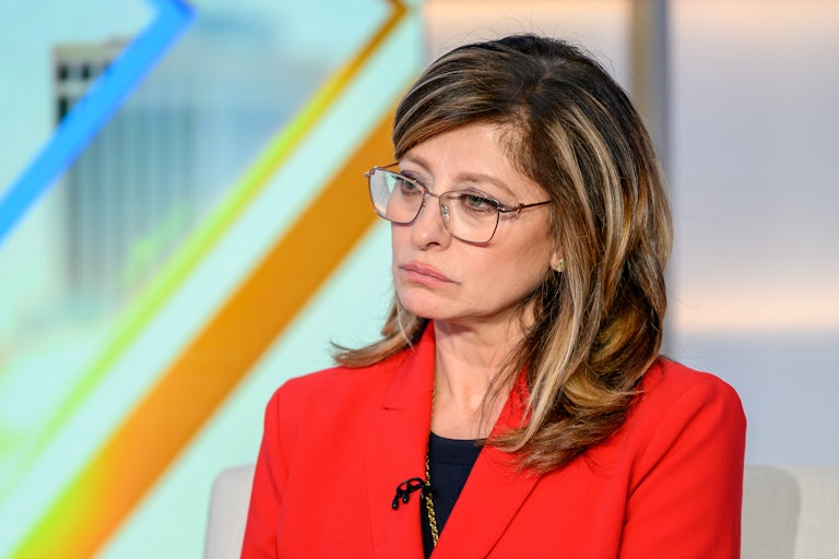 Maria Bartiromo sits on the set of her television show