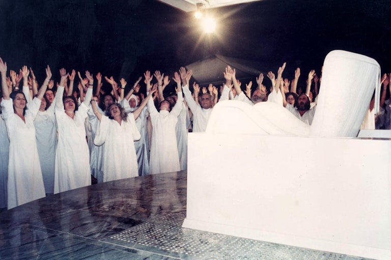 Members of the Osho Ashram in Pune, India in 1991, marking the first anniversary of the death of their leader the Bhagwan Rajneesh