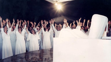 Members of the Osho Ashram in Pune, India in 1991, marking the first anniversary of the death of their leader the Bhagwan Rajneesh