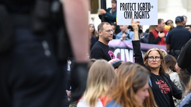 Demonstrators in favor of LGBTQ rights rally outside the US Supreme Court in Washington, DC