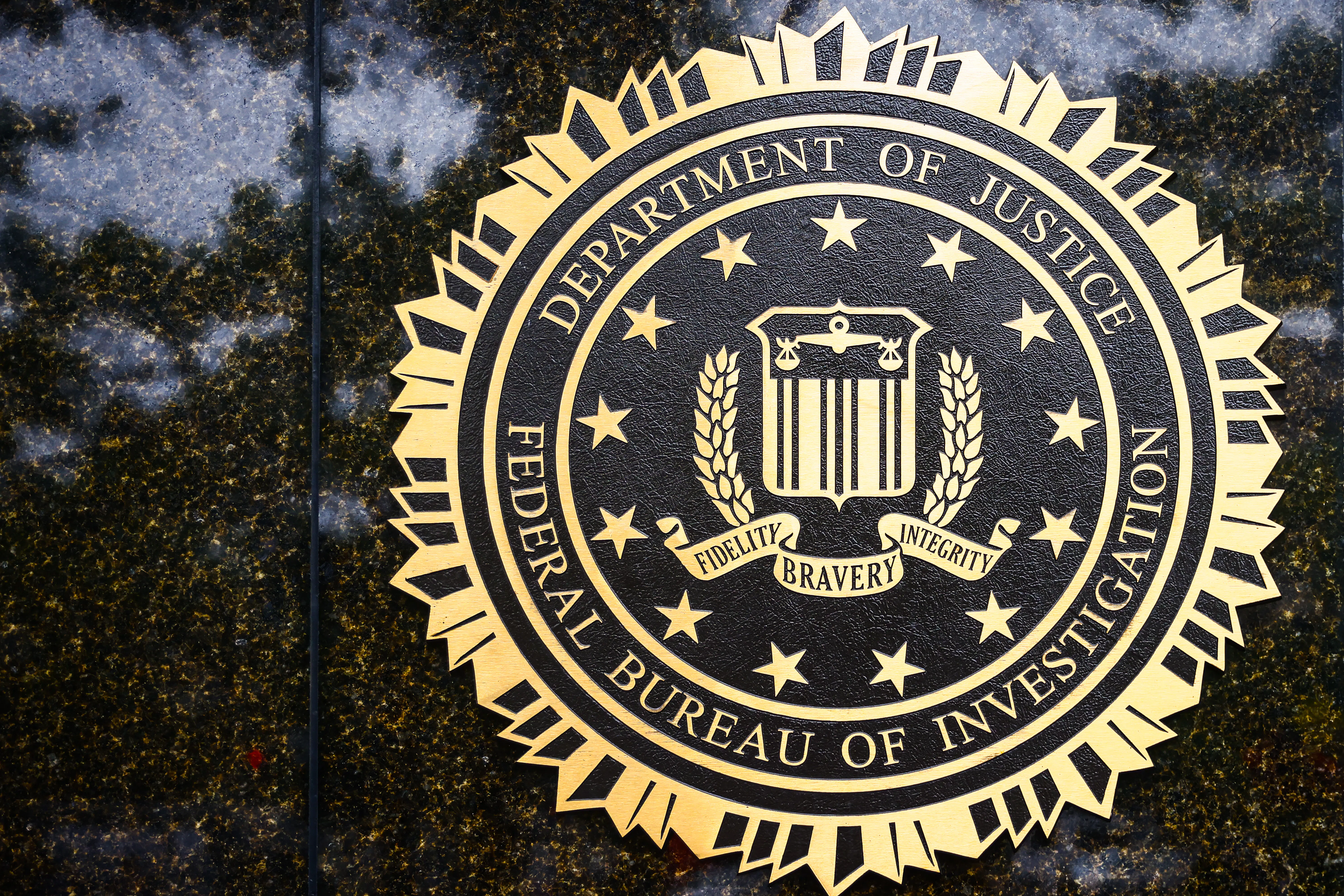 fbi logo on doj building