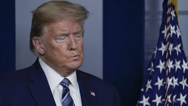 President Trump listens during a briefing at the White House.