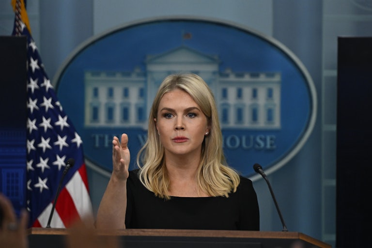 White House press secretary Karoline Leavitt gestures at reporters during a briefing