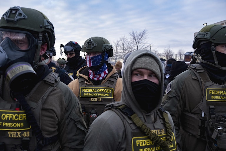 Masked federal immigration agents in Minneapolis, Minnesota