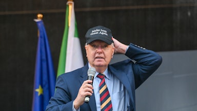 Lindsey Graham wears a Make Iran Great Again hat in February