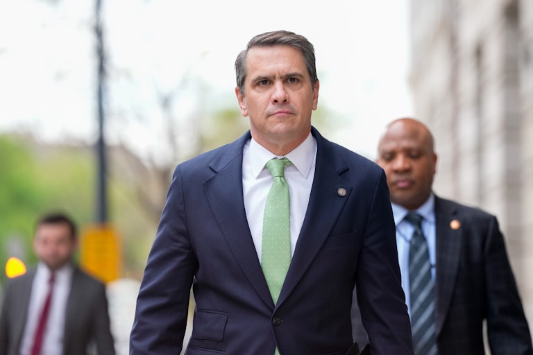 Todd Blanche walks outside a courthouse in Washington, D.C.