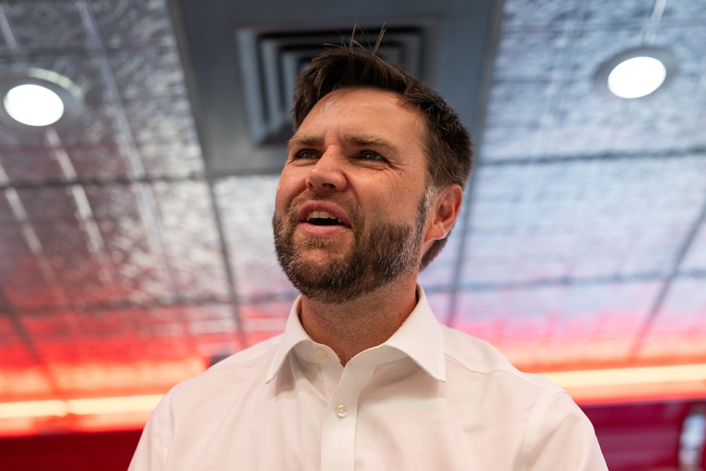 J.D. Vance grins