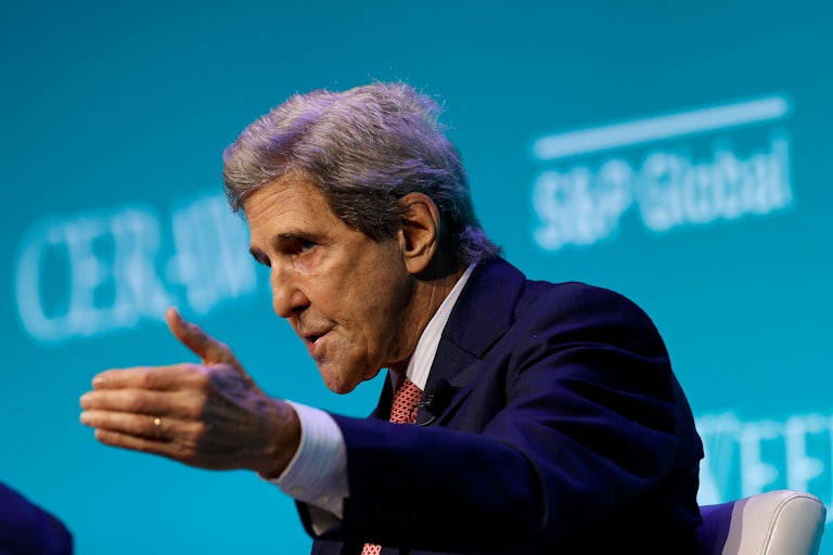 John Kerry gestures while speaking.