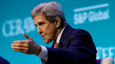 John Kerry gestures while speaking.