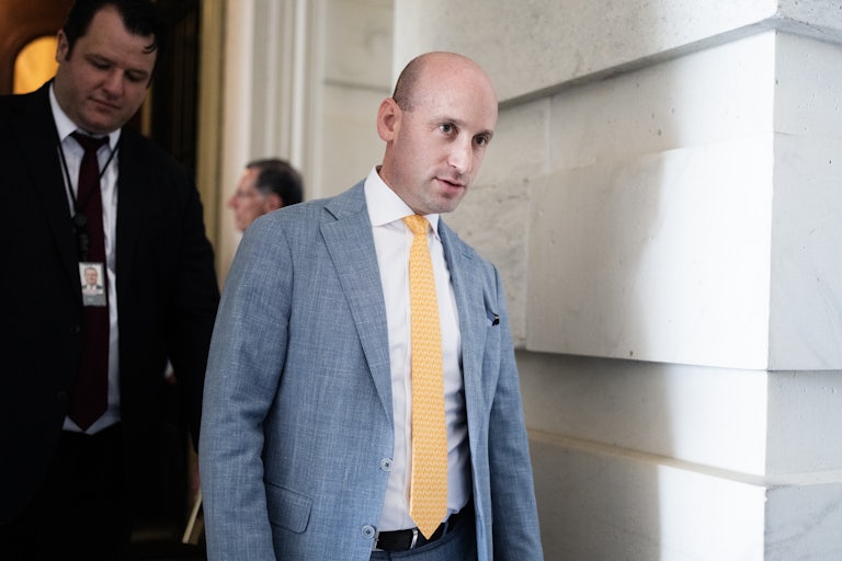 Stephen Miller walks out of the Capitol