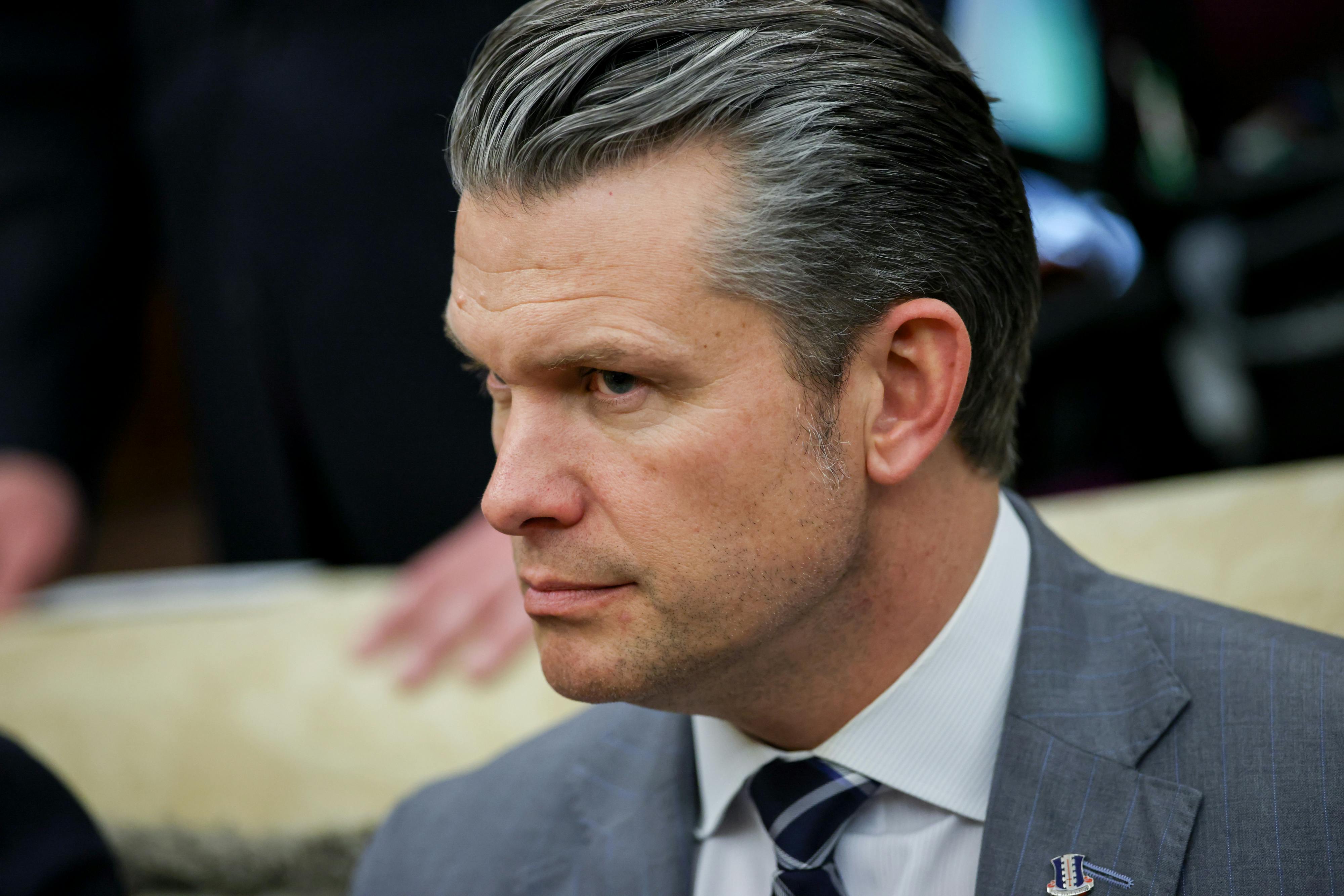Defense Secretary Pete Hegseth sits in the Oval Office
