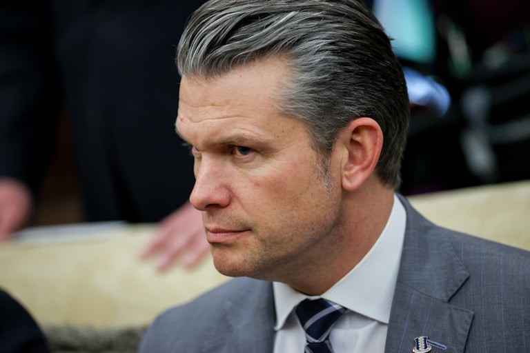 Defense Secretary Pete Hegseth sits in the Oval Office