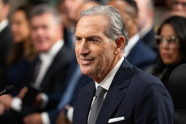 Howard Schultz smiles