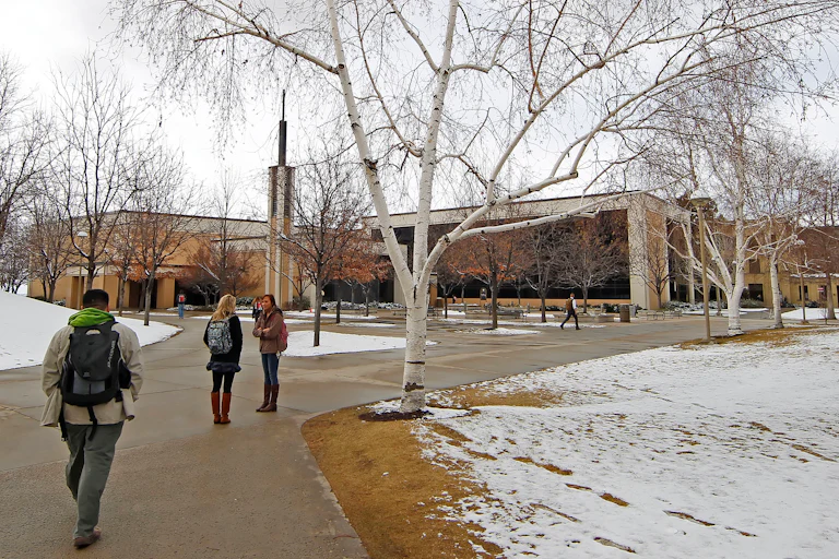 Students walk on the campus of Brigham Young University.