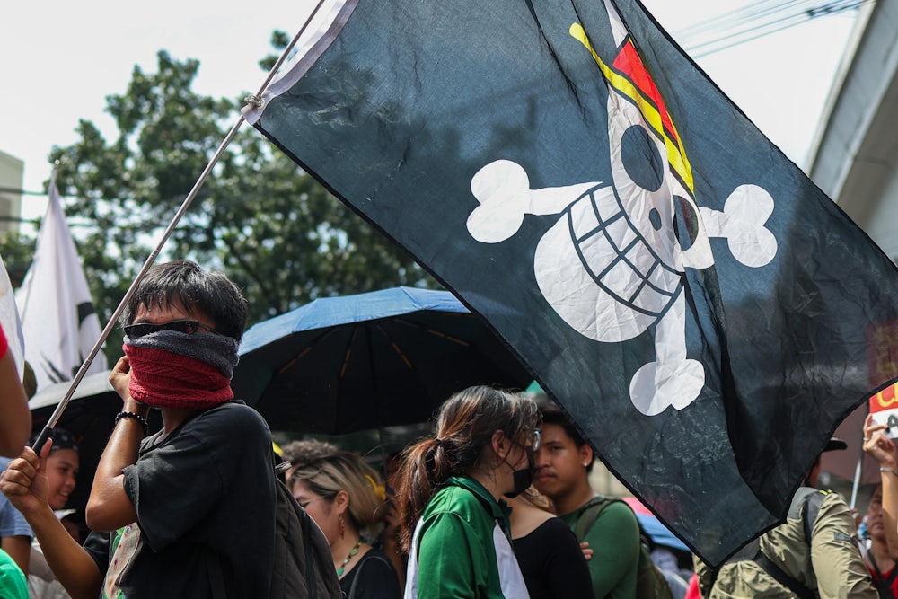 A protester with a One Piece flag, during a demonstration against corruption under President Ferdinand Marcos Jr’s administration, in Manila, Philippines on October 21, 2025.