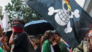 A protester with a One Piece flag, during a demonstration against corruption under President Ferdinand Marcos Jr’s administration, in Manila, Philippines on October 21, 2025.