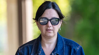 CBS News chief Bari Weiss walks at a conference