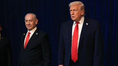 Israeli Prime Minister Benjamin Netanyahu smiles as U.S. President Donald Trump appears to zone out.