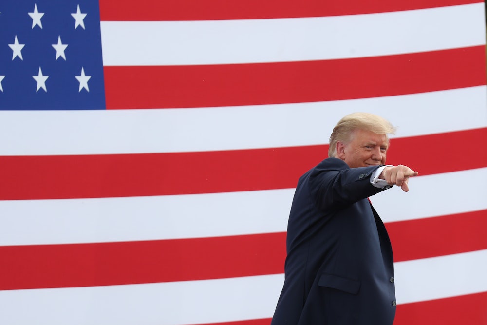 President Donald Trump gestures as he leaves after speaking about the environment in Florida.