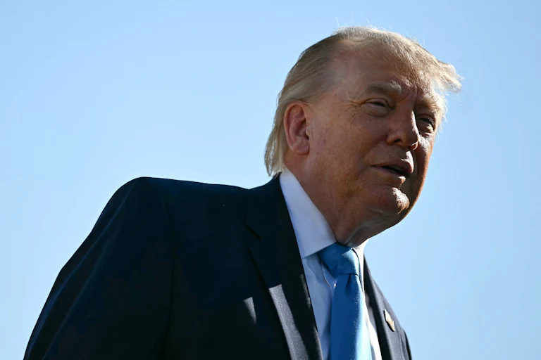 Donald Trump speaks to reporters