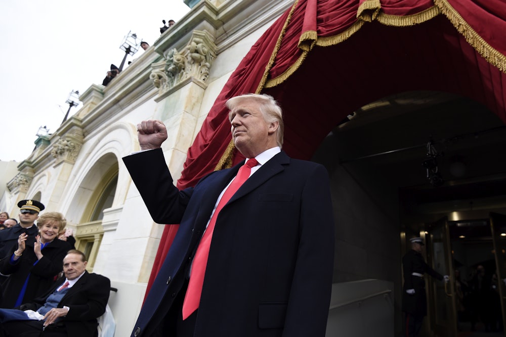 WASHINGTON, DC - JANUARY 20: US President-elect Donald Trump arrives for his Presidential Inauguration at the US Capitol on January 20, 2017 in Washington, DC.