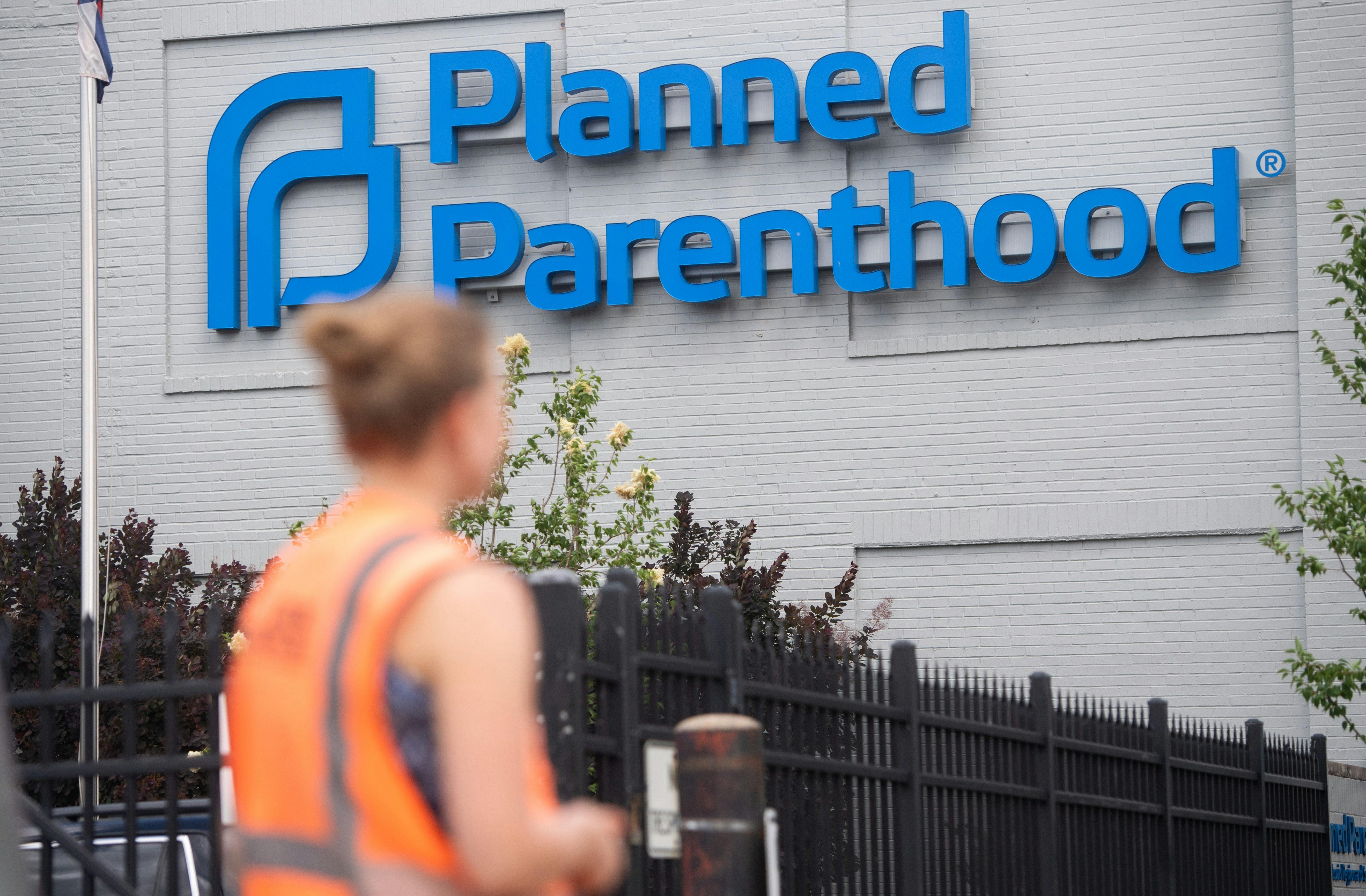A person stands outside the Planned Parenthood Reproductive Health Services Center in St. Louis, Missouri, the last location in the state performing abortions