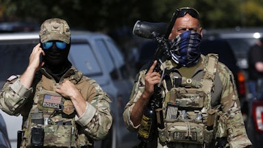 Masked Customs and Border Protection Border Patrol agents in Chicago