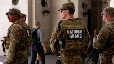 Members of the National Guard stand outside Union Station in Washington, D.C.