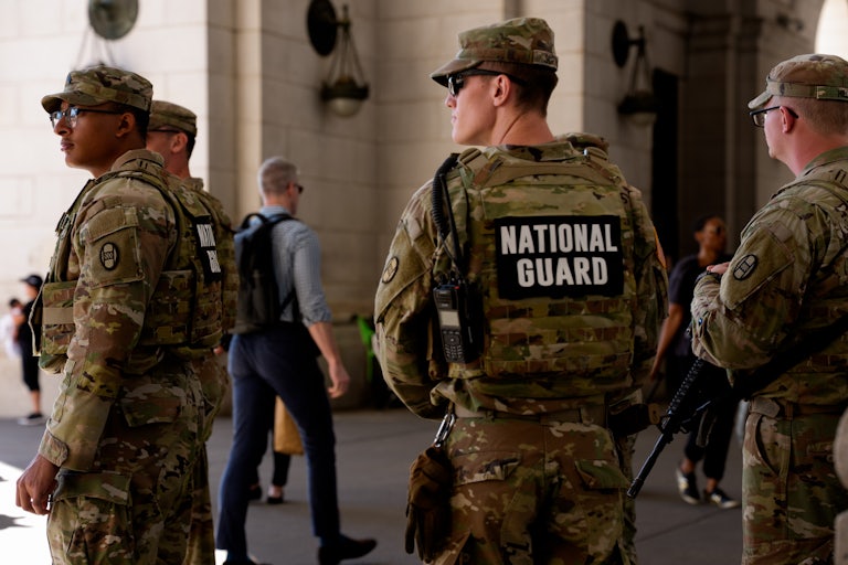 Members of the National Guard stand outside Union Station in Washington, D.C.